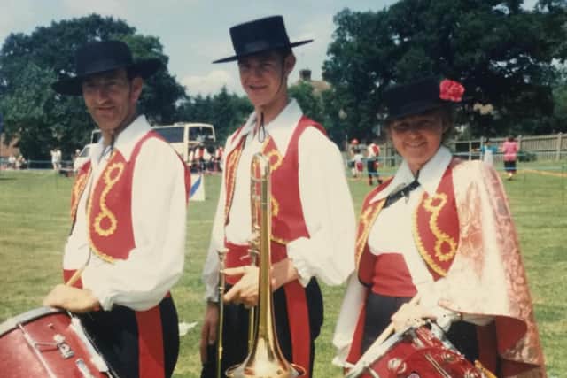 David in the Derby Serenaders with his mum, Shirley Bell, and dad, Brian Bell, on either side.