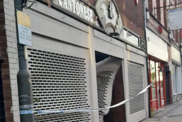 A car smashed into the front of the building this morning.