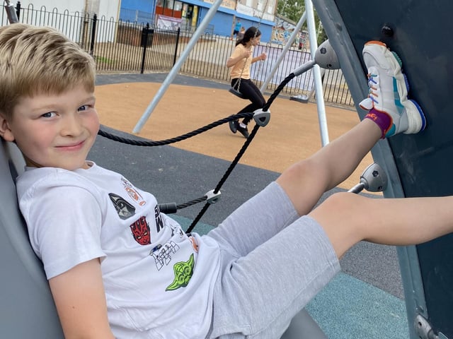 Children try out the new play area