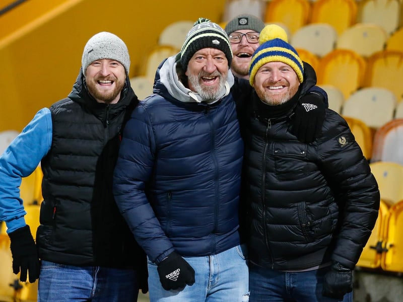 Mansfield Town's faces in the crowd against Swindon Town.