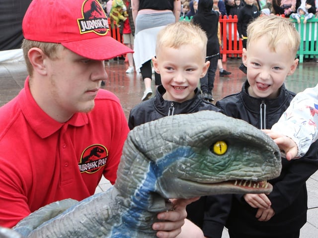 Youngsters meet Blue the Velociraptor
