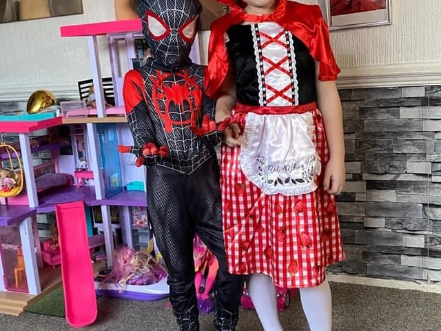 Roxy-Marie aged eight as Little Red Riding Hood and Danni-Louise aged six as Spider-Man.