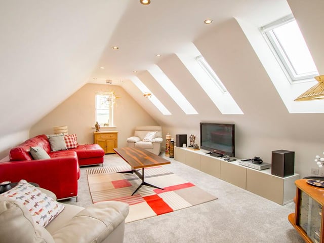 This room is currently used as a sitting room, but, it can also be used as a bedroom.