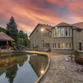 The grounds offer a peaceful and versatile setting for enjoying outdoor living.