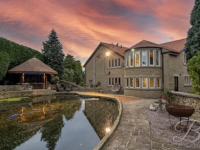 The grounds offer a peaceful and versatile setting for enjoying outdoor living.