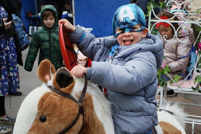 Four-year-old Eden rides in to save the day on his horse.