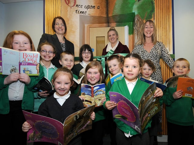 Rebecca Adlington with pupils at the Oak Tree Lane Primary School where she opened their new library in 2013.