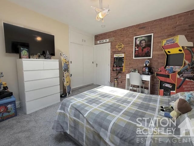 The property boasts four bedrooms, perfect for a family.