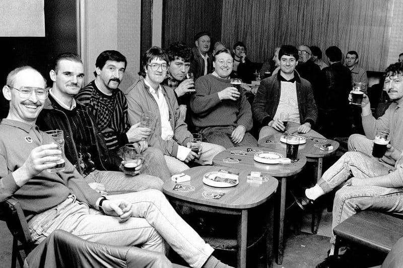 Mansfield Colliery, March 1988. Miners have a drink in the welfare after their last shift.