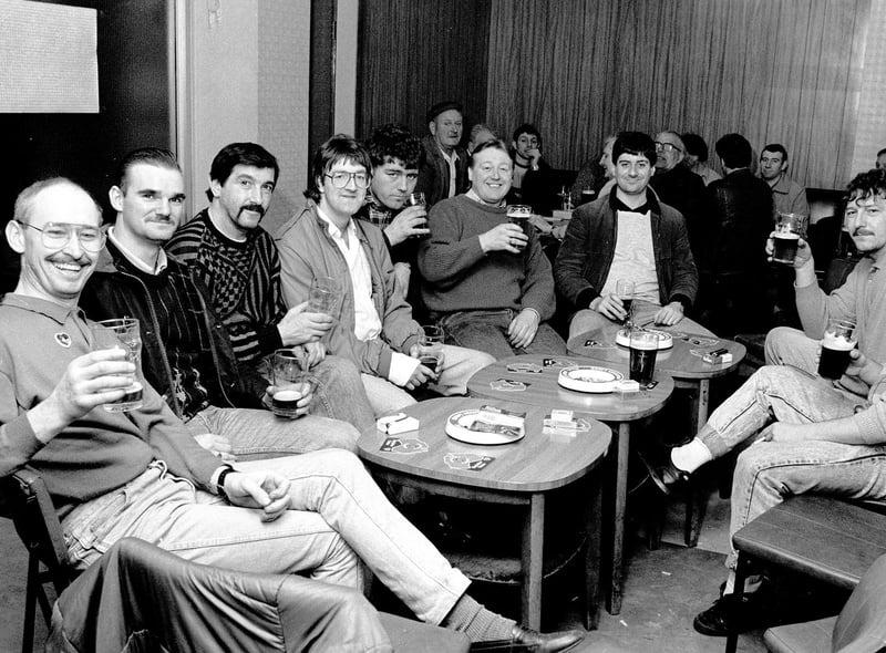 Mansfield Colliery, March 1988. Miners have a drink in the welfare after their last shift.