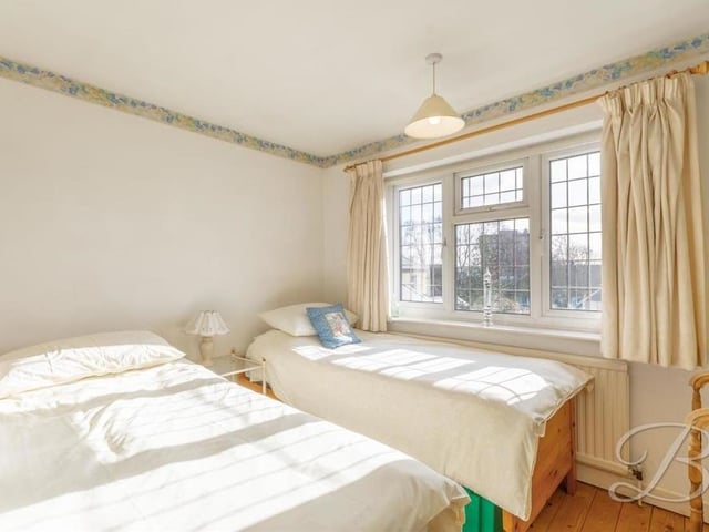 The second bedroom, which has fitted carpets, overlooks the back garden.