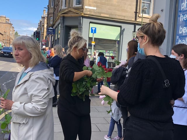 The roses were to be laid atop of the hearse as it passed through Morningside on the way to the cemetery
