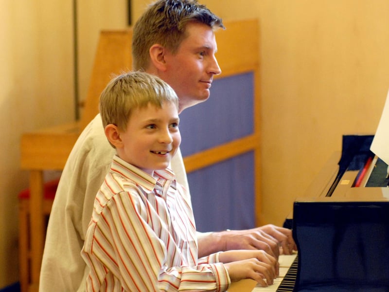 James left and David Cooke perform a duet at the 2008 Mansfield Music and Drama Festival