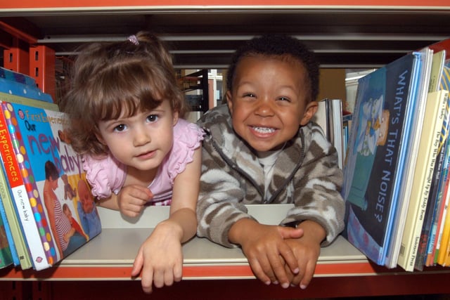 Kady-May Colbourne, 2, and Reuben Haines, 2, start off the Book Crawl at Mansfield Woodhouse Library today. Children had the opportunity to meet the Bookstart Bear and to join in a singing session. 2007.