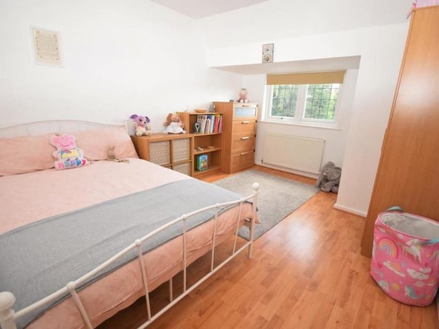 The second double bedroom at the £550,000-plus home is smaller than the first but still a good size. It has a laminated floor and a window to the front of the property.