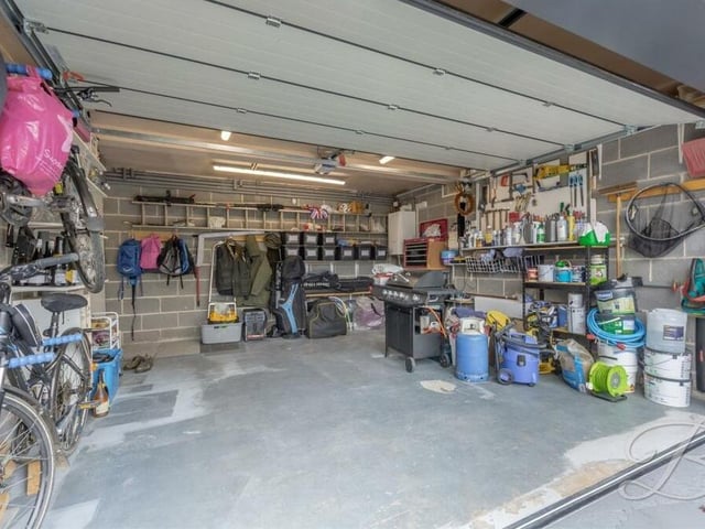 Not many estate agents let us look inside a property's garage, so full credit to BuckleyBrown. As you can see, it is a terrific size, with space for storage or even a workshop.