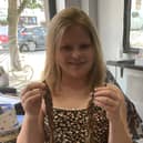 Faith Bidwell has donated her long hair to The Little Princess Trust charity