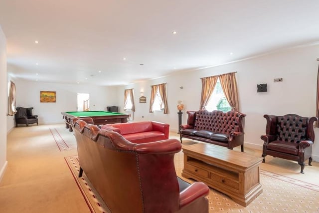 It's time to move into the self-contained apartment now. Probably its most impressive asset is this snooker room and lounge.