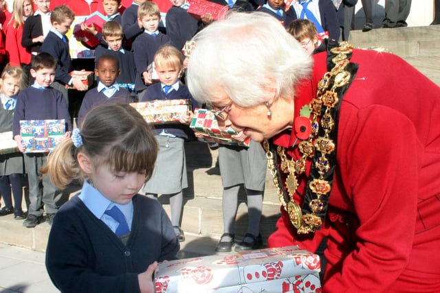 The 2006 launch of Operation Christmas Child in Chesterfield by town Mayor Trudy Mulcaster. Emily Sobczak from St Mary's in the foreground but children from both St Mary's and Brampton attended