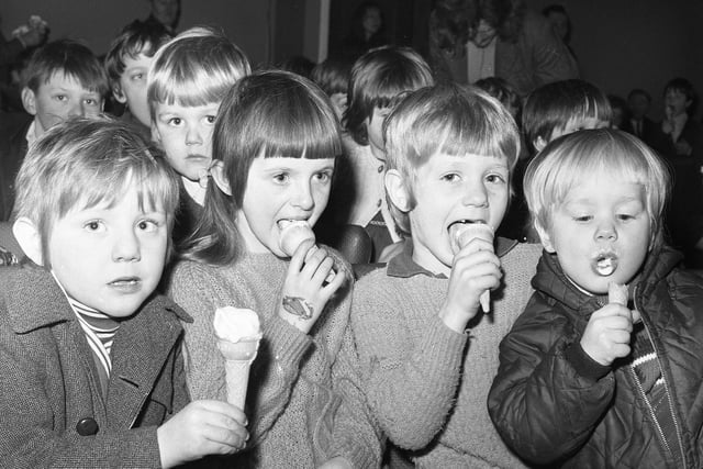 These children were pictured enjoying an ice-cream during a break of the film show at North Biddick Workmen's Club in 1974. Do you recognise any of them?.