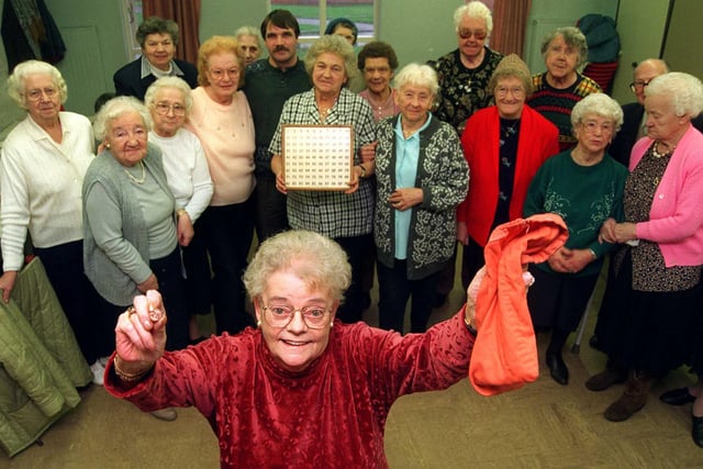Pictured at  the Meeting Hall, Wincobank Ave, Sheffield in 1997, where  Mrs Freda Askham is seen holding the bag of old Bingo numbers, that the Sunshine Club use for their Bingo games. The numbers are wearing out, and they are  wanting a modern  system  of picking the numbers.