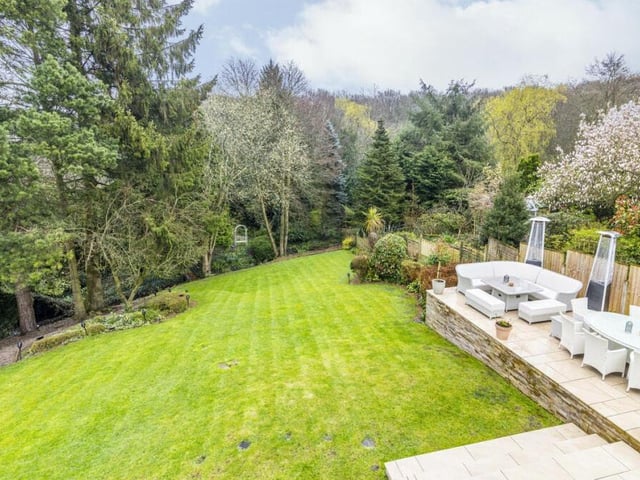 A view from one of the bedrooms of the rear garden. It is meticulously landscaped and and offers both privacy and tranquillity.