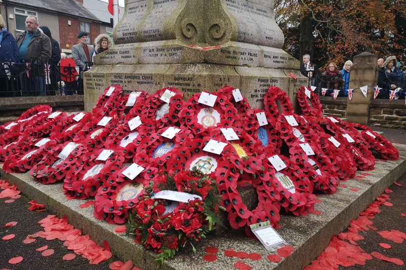 Like many around the district, Kirkby's cenotaph was covered with wreaths as people paid their respects