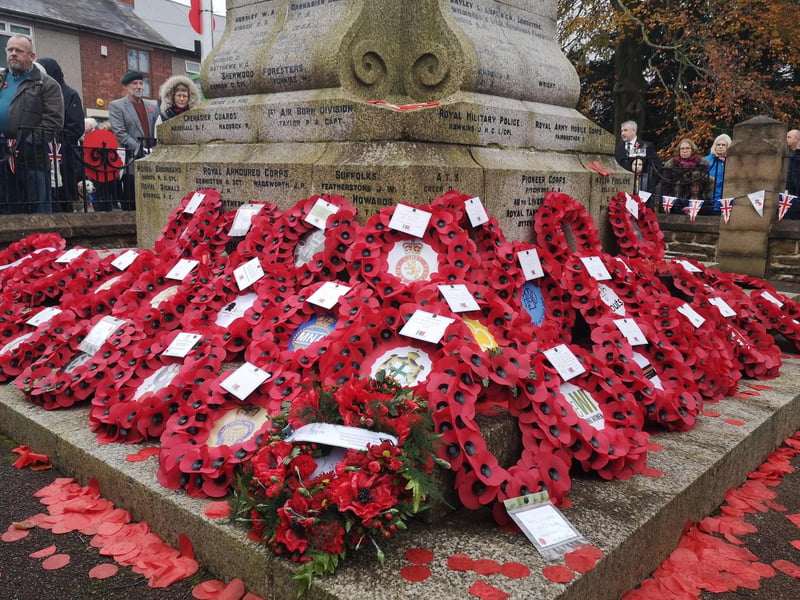 Like many around the district, Kirkby's cenotaph was covered with wreaths as people paid their respects