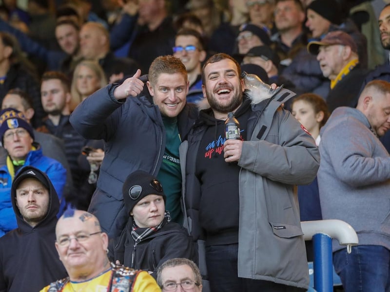 Mansfield Town fans watch the brilliant win at Peterborough United.