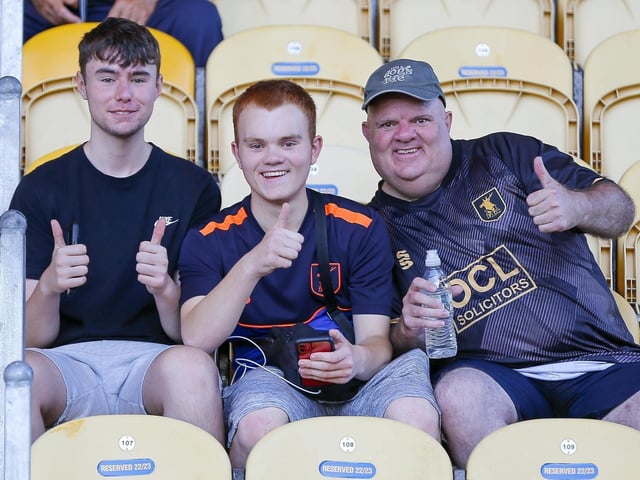 Mansfield fans watch the Carabao Cup first round match against Derby County FC at the One Call Stadium.