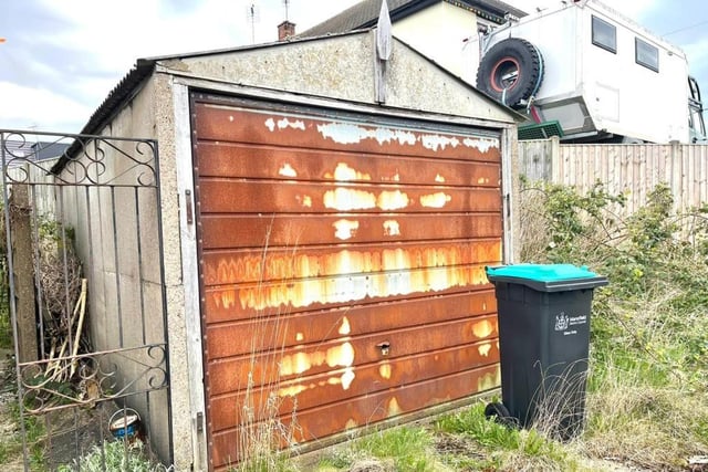 It's seen better days, but this detached garage could be converted into a real asset at the Armstrong Road property.