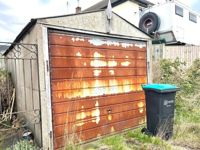 It's seen better days, but this detached garage could be converted into a real asset at the Armstrong Road property.