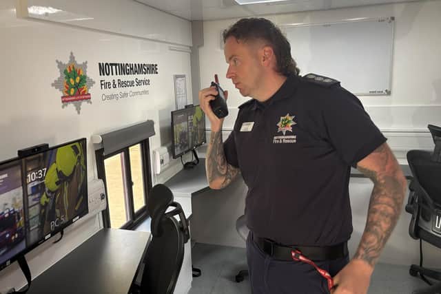 Station manager Sam Mills gets to grips with the new Command Support Unit.