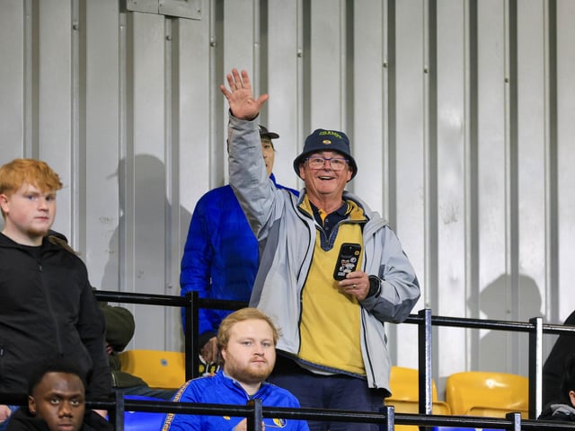 Travelling Mansfield Town fans during the Sky Bet League One match against AFC Wimbledon at Stadium Plough Lane.