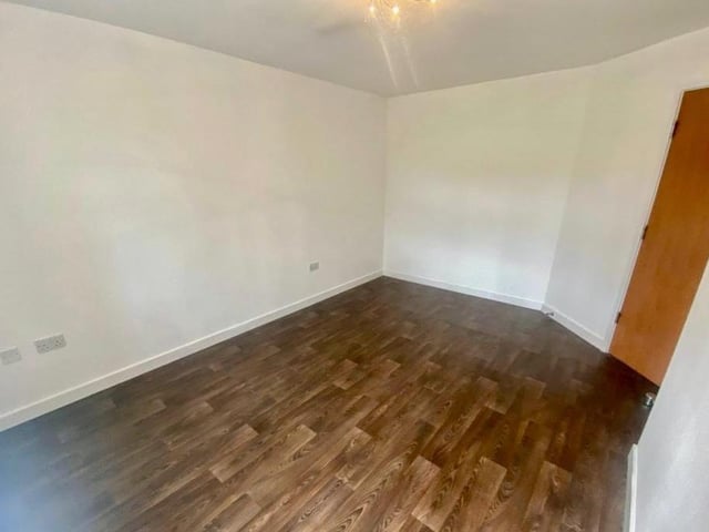 Another shot of one of the bedrooms, although, in truth, the room has multiple uses. If you're a single person moving in, you might want to use this space as an office, a study, or even a room to entertain family and friends.