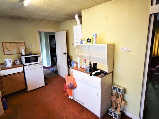 This is the kitchen from another angle. Ripe for a bit of TLC, but a lot to work with.