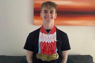 Thomas Swales with his Regional long course medals.