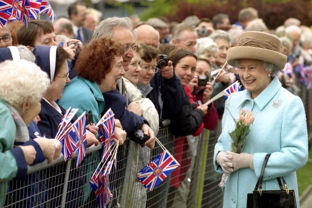 The Queen meeting crowds in Mowbray Park after she officially opened the Winter Gardens in 2002.
