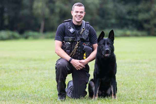 Dog handler PC Chris Duffy with police dog Reno