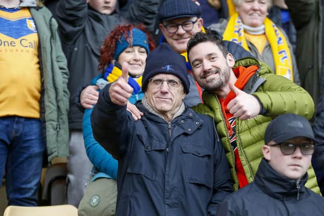 Traveling Stags fans watch the Sky Bet League 2 match against Bradford City AFC at the Utilita Energy Stadium, 04 Feb 2023 Photo credit : Chris Holloway / The Bigger Picture.media:f