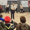 Steve Cree explains to 10th Mansfield Scouts the significance of the Peace Light