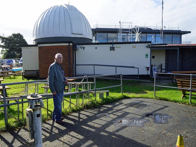 David Collins, founder member standing on the telescope pad.
