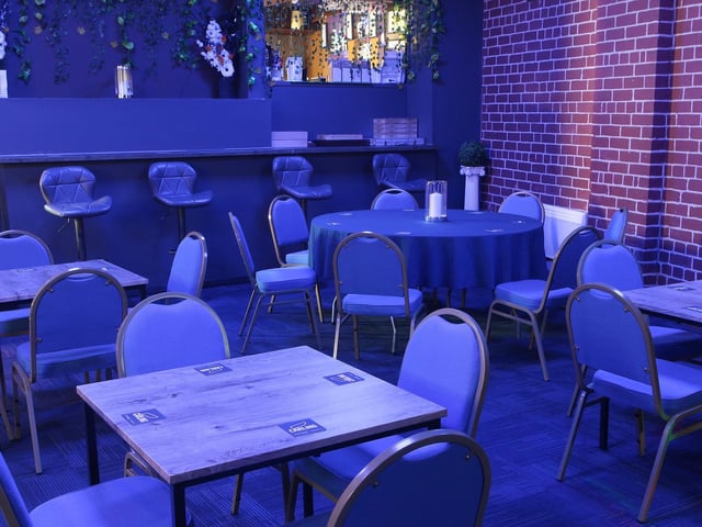 The owner of the tavern is eager to preserve the community spirit that the former social club had.