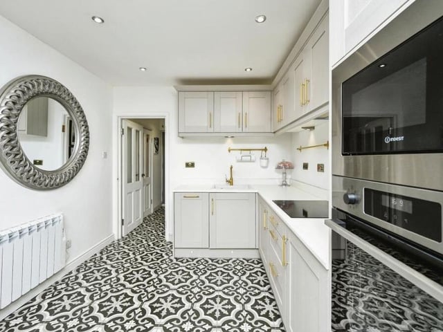 The well-appointed kitchen combines functionality with style. It features sleek countertops, ample storage space and modern appliances. Whether you're a gourmet chef or a casual cook, it provides the ideal setting for culinary adventures.