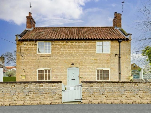 Before we look inside the cottage, let's check out its charming frontage. Built more than 100 years ago, it has been sympathetically restored and retains many of its original features.