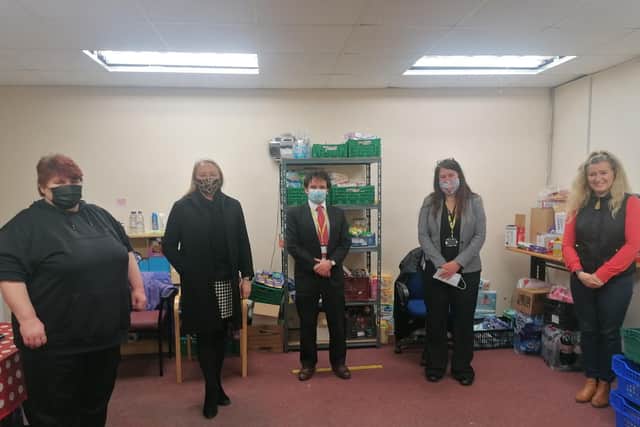 Pictured are ‘Christine,’ a foodbank volunteer, Carol Cooper-Smith, ADC CEO, Simon Martin, Vice Principal ATTFE, Liz Barret, Principal ATTFE and Linda Smith, Let’s All Eat Manager