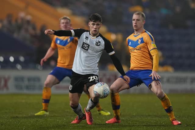 Mansfield Town's Neal Bishop has signed up to be an NHS volunteer and is doing his bit for the community during the ongoing lockdown.
