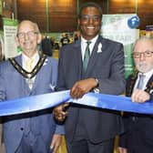Broxtowe MP Darren Henry cutting the ribbon at the job fair with councillors inside Kimberley Leisure Centre.