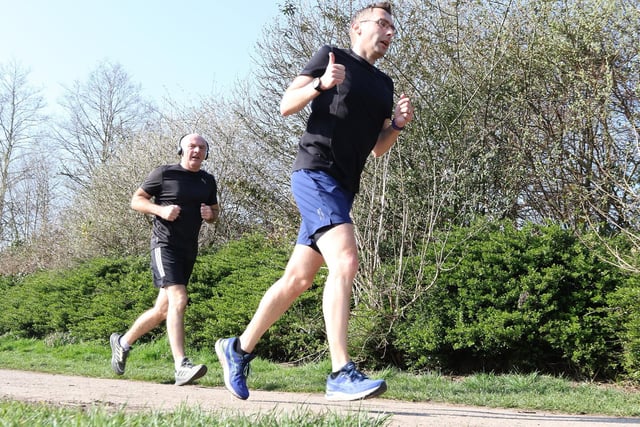 A cheery thumbs-up from this runner as he tackles the course at the Manor Park Sports Complex in Mansfield Woodhouse.