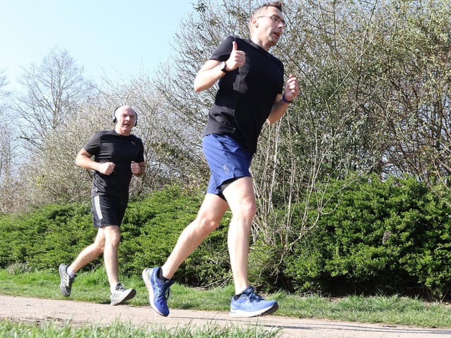 A cheery thumbs-up from this runner as he tackles the course at the Manor Park Sports Complex in Mansfield Woodhouse.
